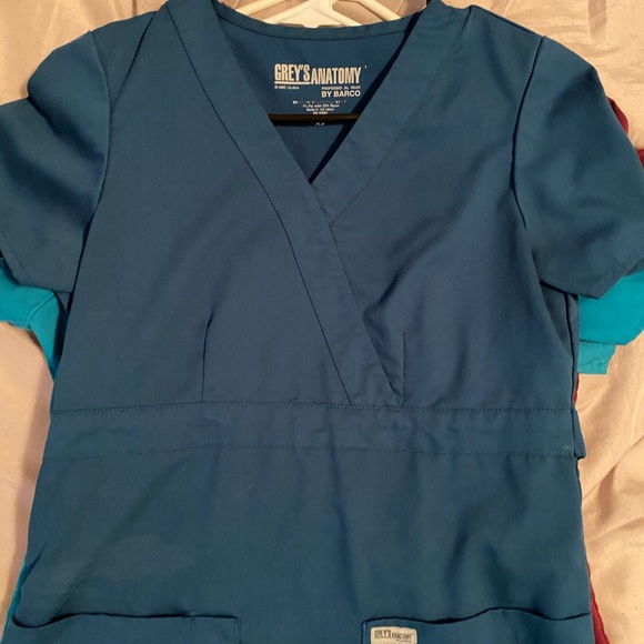 Scrub tops, jacket, and scrub bottoms. - Picture 3 of 5